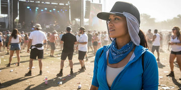Festival attendee wearing cooling gear in direct sun.